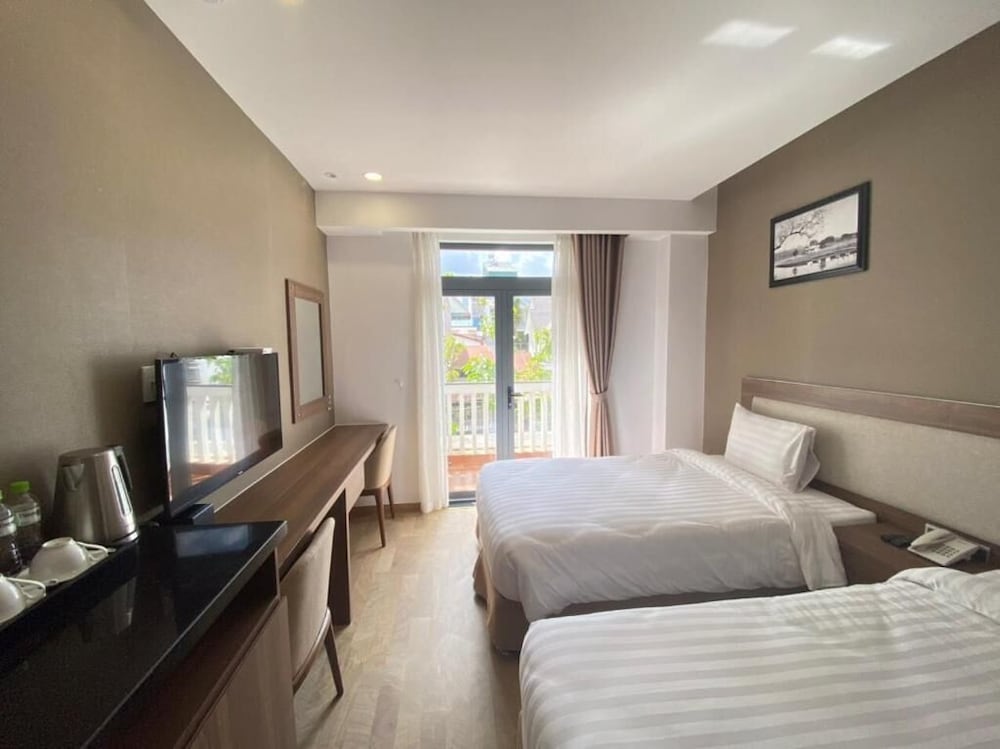 Deluxe Room - Photo 13