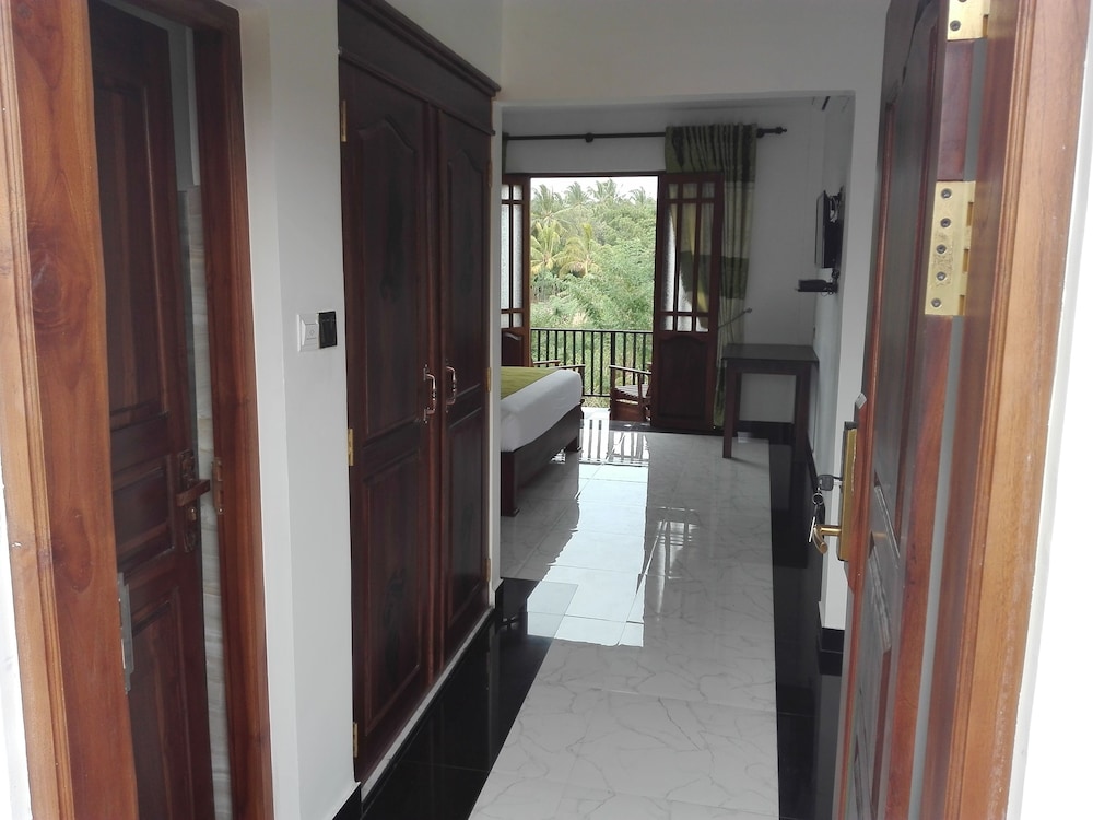 Deluxe Triple Room, 1 Bedroom, Garden View, Garden Area photo 3