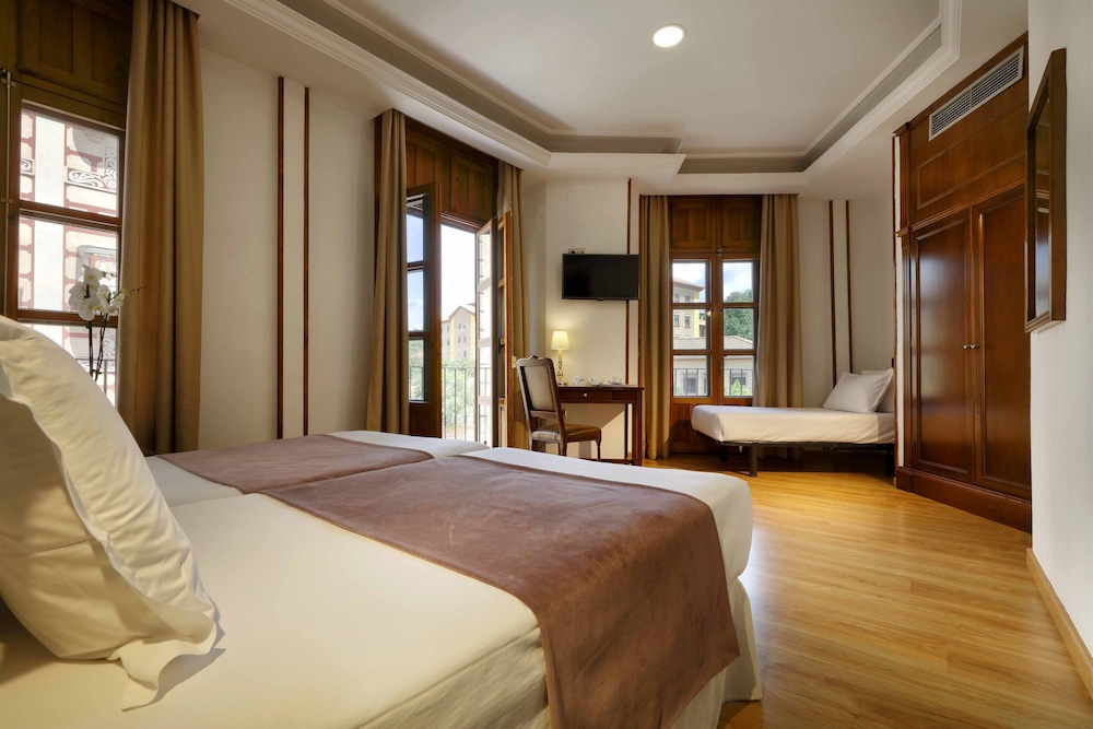 Triple Room - Photo 1