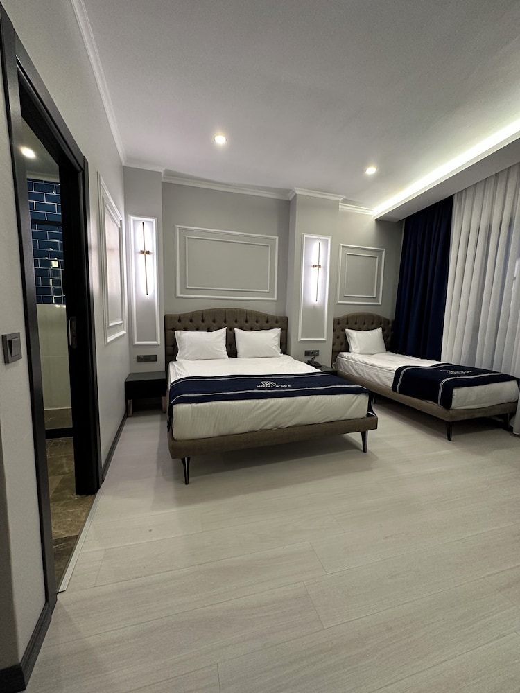 Deluxe Triple Room - Photo 1