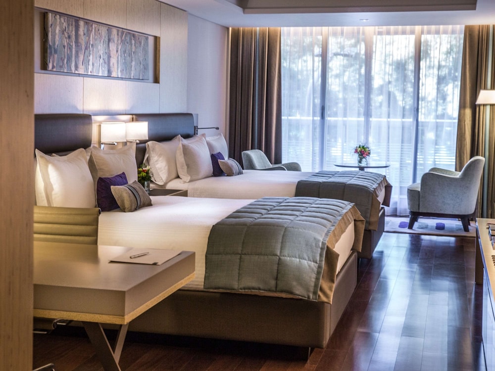 Deluxe Suite, 2 Double Beds, Balcony thumbnail 6
