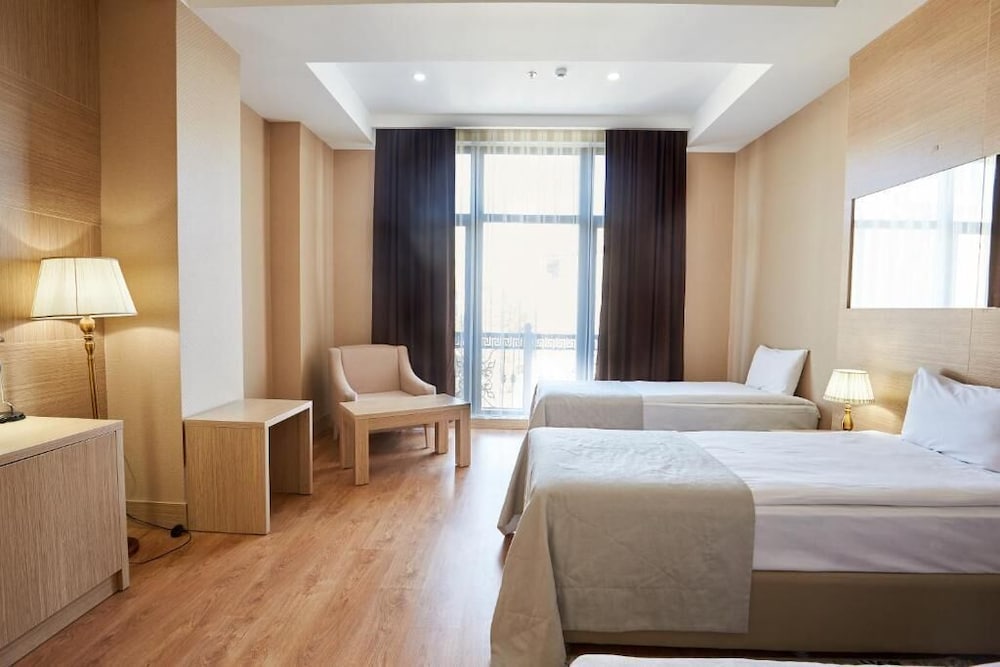 Standard Twin Room - Photo 10