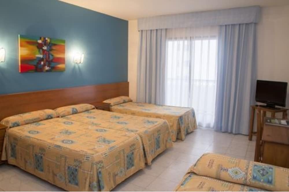 Habitación Cuádruple (2 adultos + 2 niños)