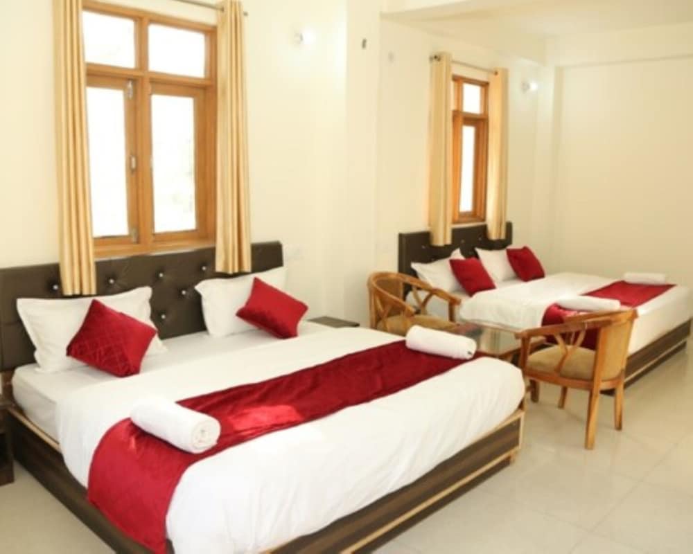 Deluxe Quadruple Room - Photo 8