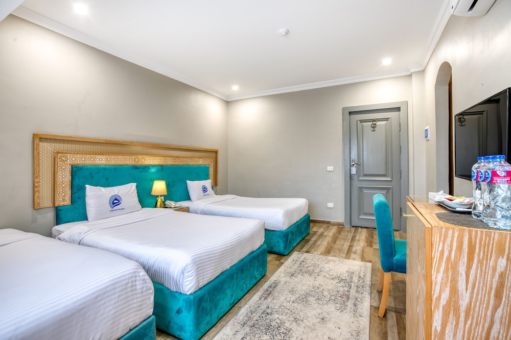 Economy Triple Room - Photo 3