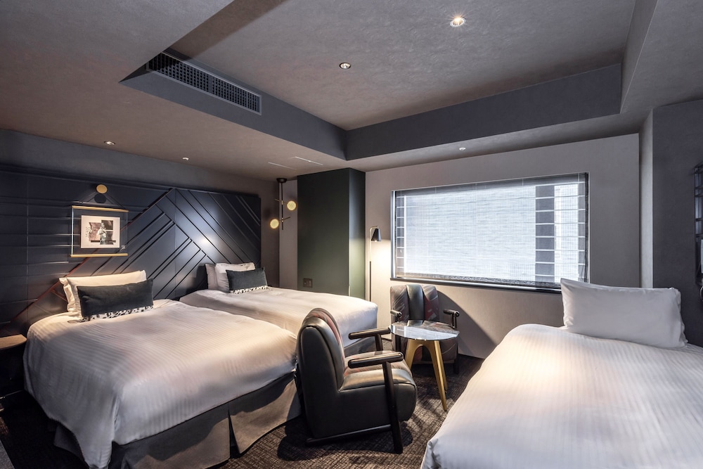 Deluxe Twin Room (with Washing Machine) - Photo 8