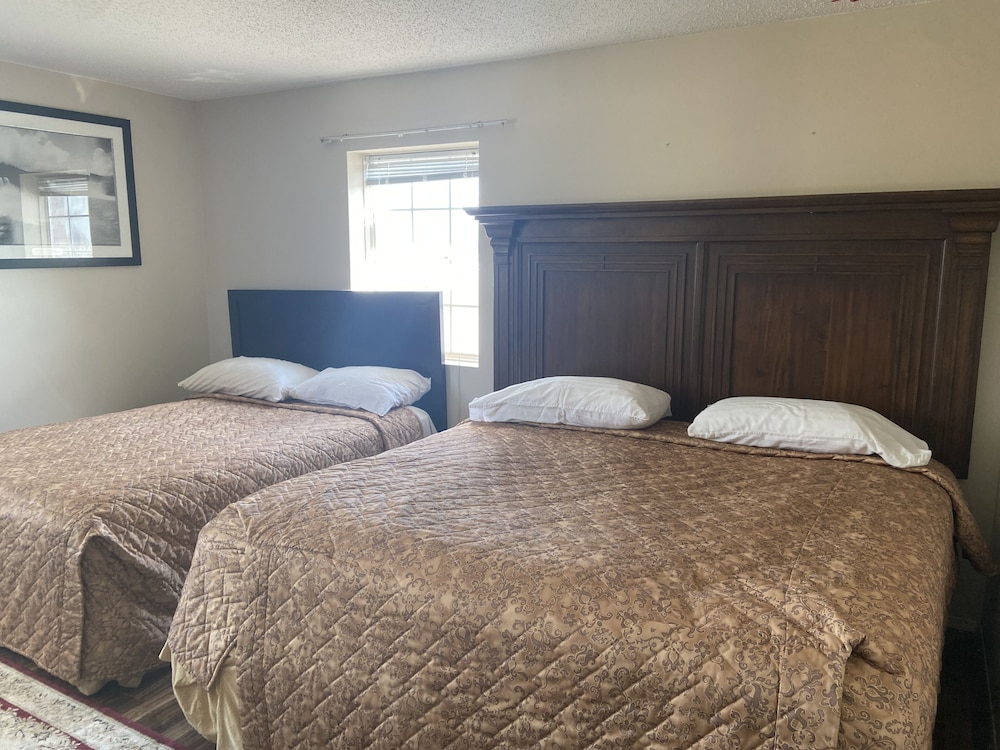 Two Queen Beds with Sofa Bed