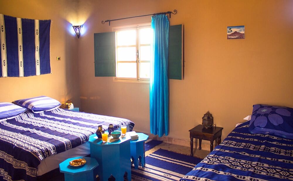 Economy Triple Room, Multiple Beds, Private Bathroom, Pool View photo 2