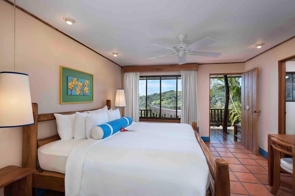 Habitación Deluxe, 1 cama King, No fumadores, Vista parcial al mar