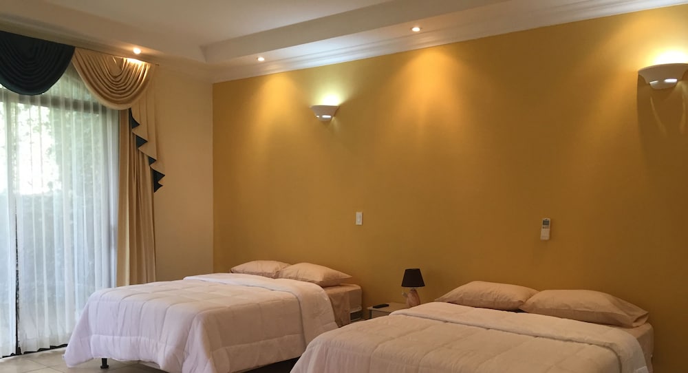 Deluxe Quadruple Room, Garden View photo 2