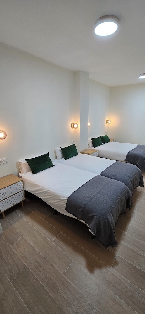 Habitación Cuádruple, Balcón, Vista a la Ciudad