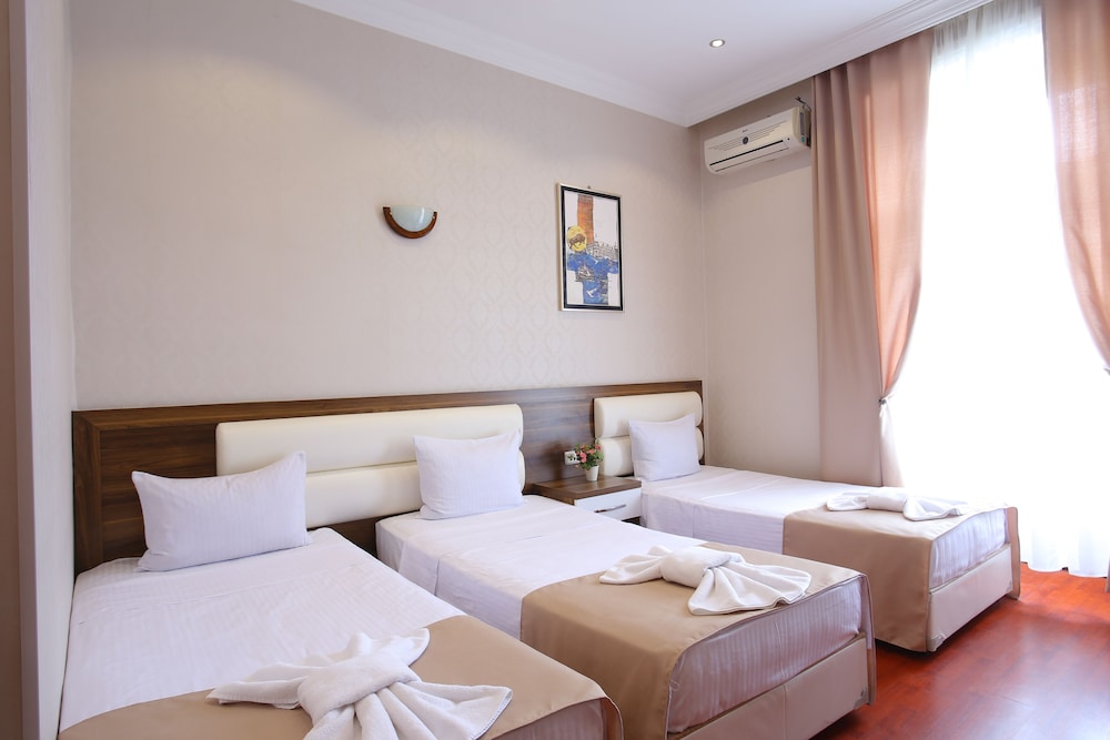 Superior Triple Room, City View