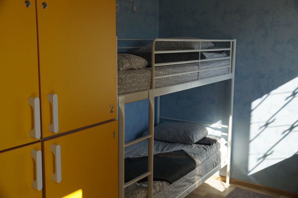 One Bed in 8-Bed Mixed Dormitory, upper bunk bed photo 1