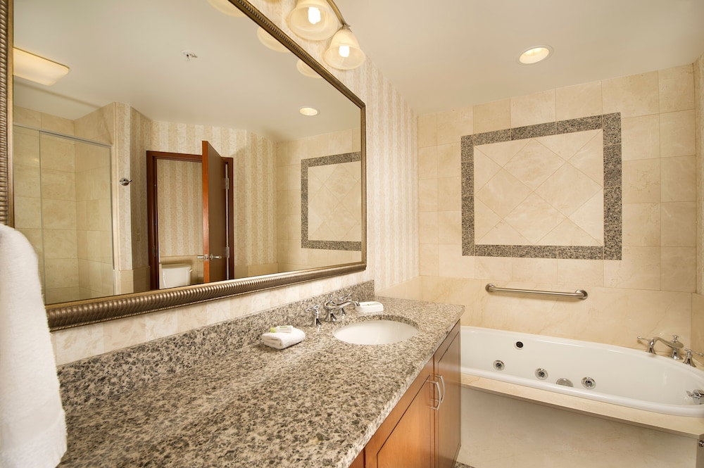 Suite, 1 King Bed, Refrigerator & Microwave (2 Rooms, Jetted tub) - Photo 2