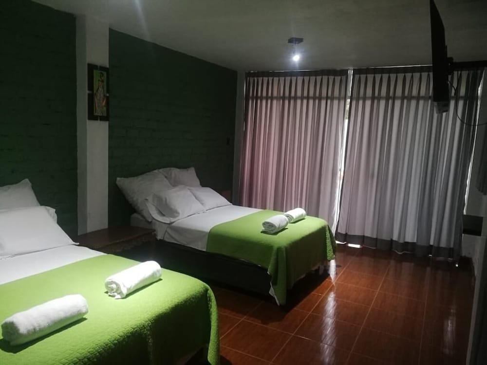 Signature Quadruple Room photo 1