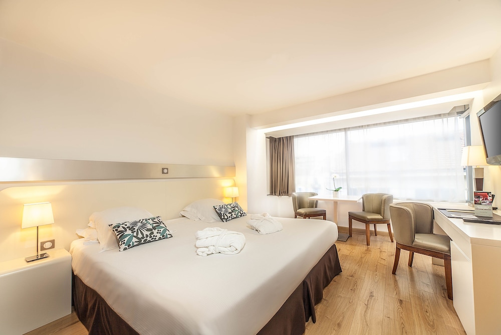 Deluxe Room - Photo 1