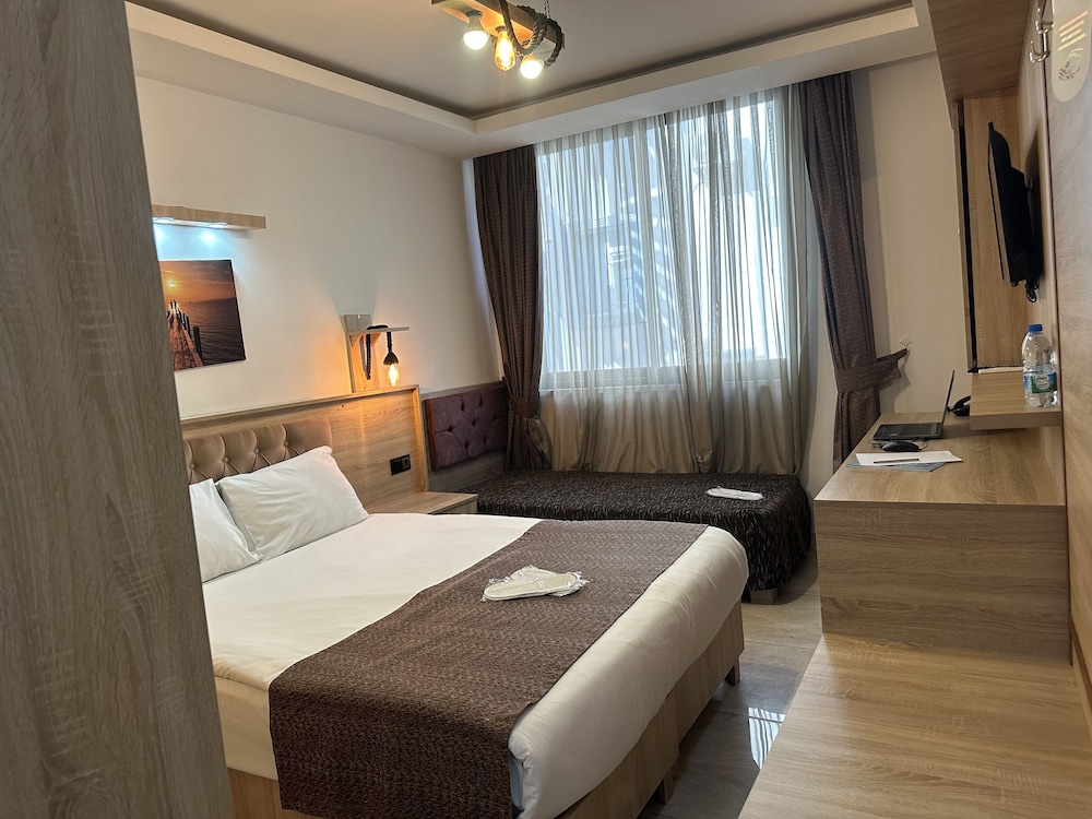 Standard Triple Room - Photo 8