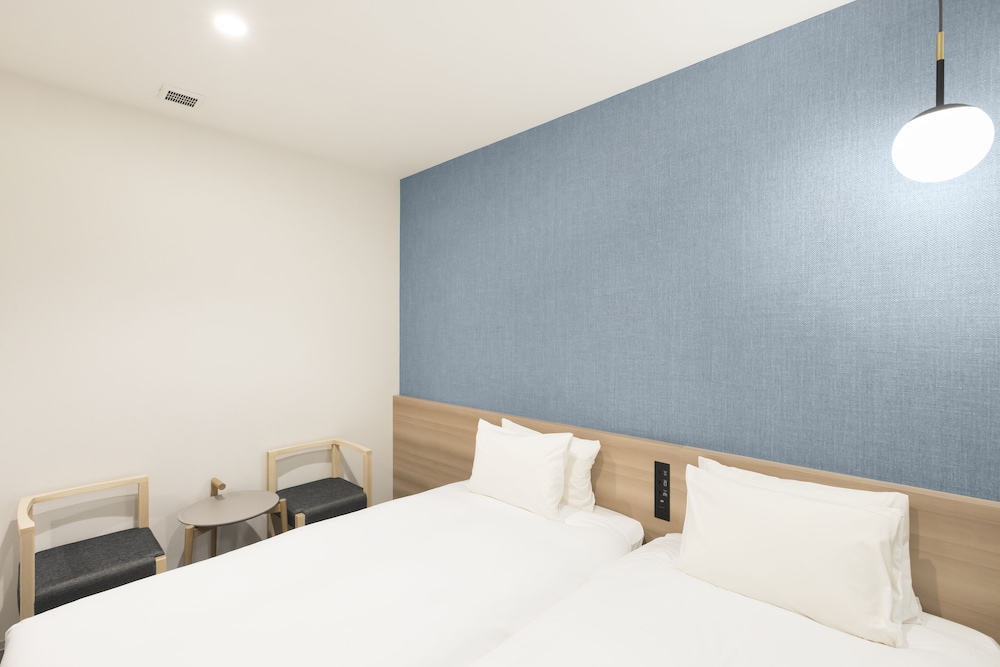 Twin Room with Extra bed - Photo 5