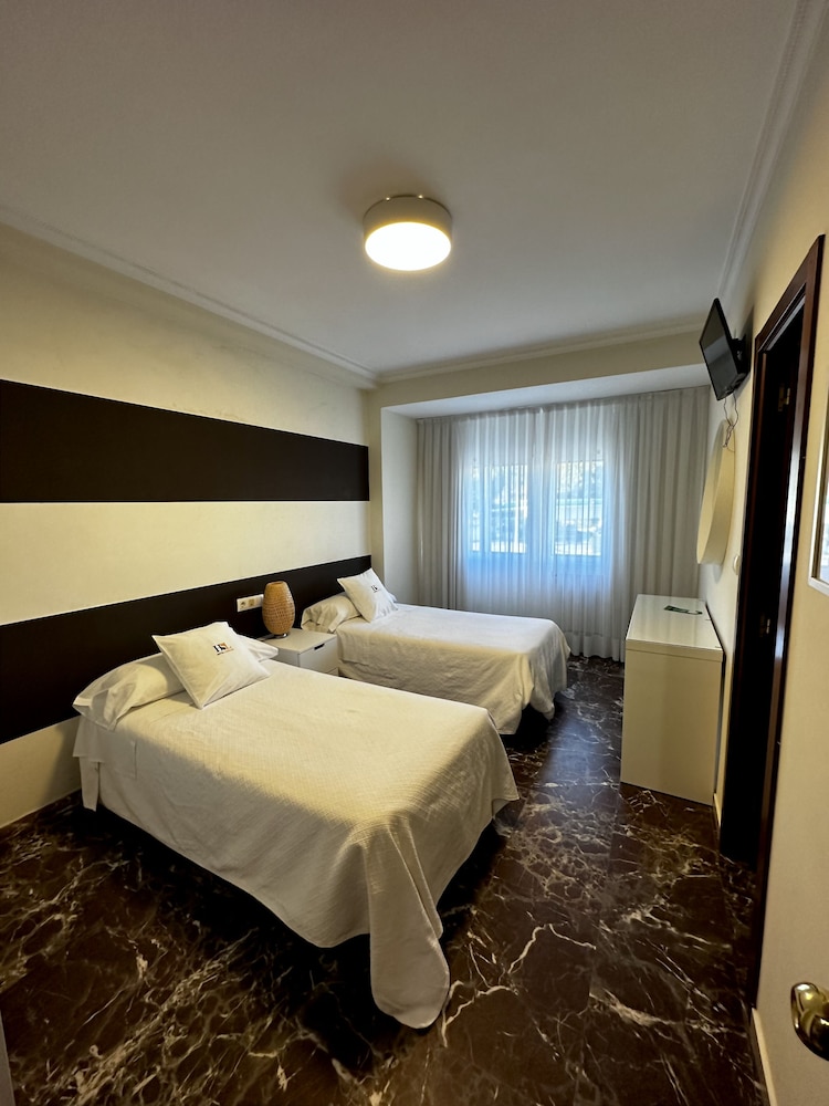 Habitación Estándar con Dos Camas Individuales
