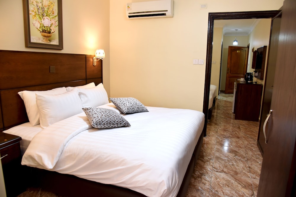 Family Quadruple Room, Multiple Beds, City View photo 3