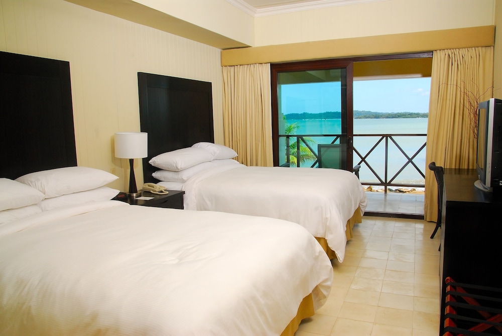 Standard Double Room, 2 Queen Beds, Beach View photo 1