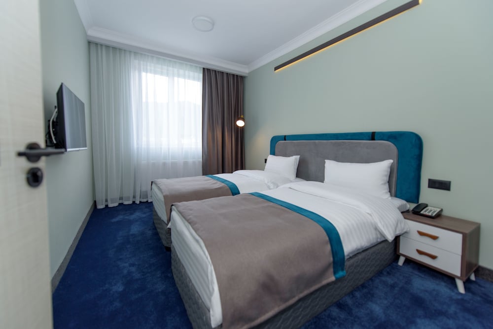 Executive Quadruple Room photo 3