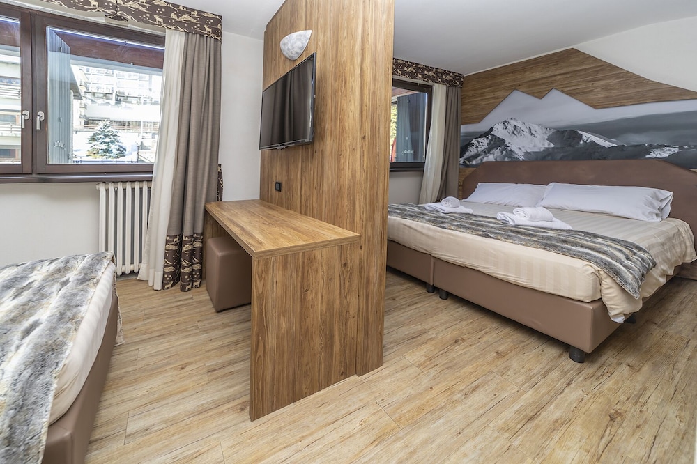 Family Quadruple Room - Photo 1