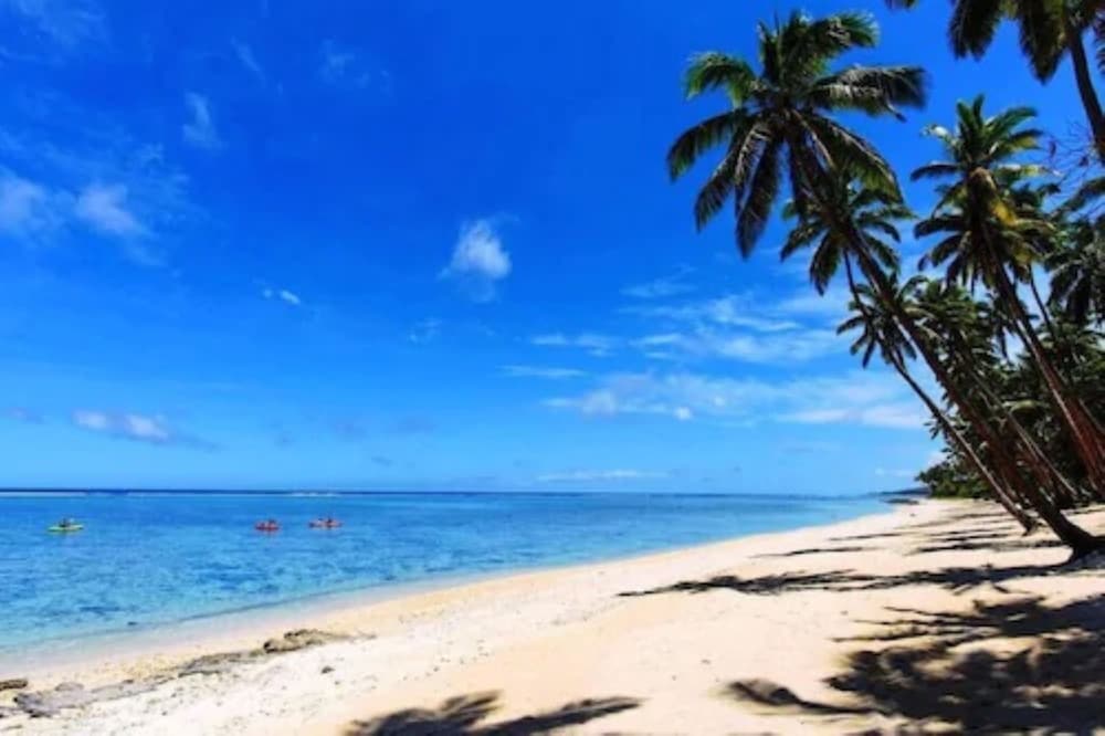 Beachfront Bure (1 Double and 2 Single Bed) photo 4