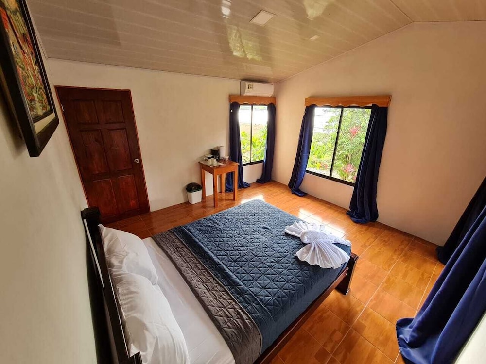 Basic Triple Room, Multiple Beds, Non Smoking, Beach View photo 2