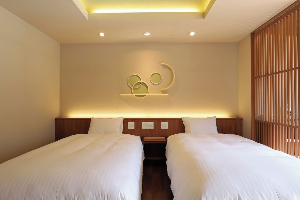 [Roshokan Japanese western style room] Twin bed with Futon & Hot spring bath photo 3