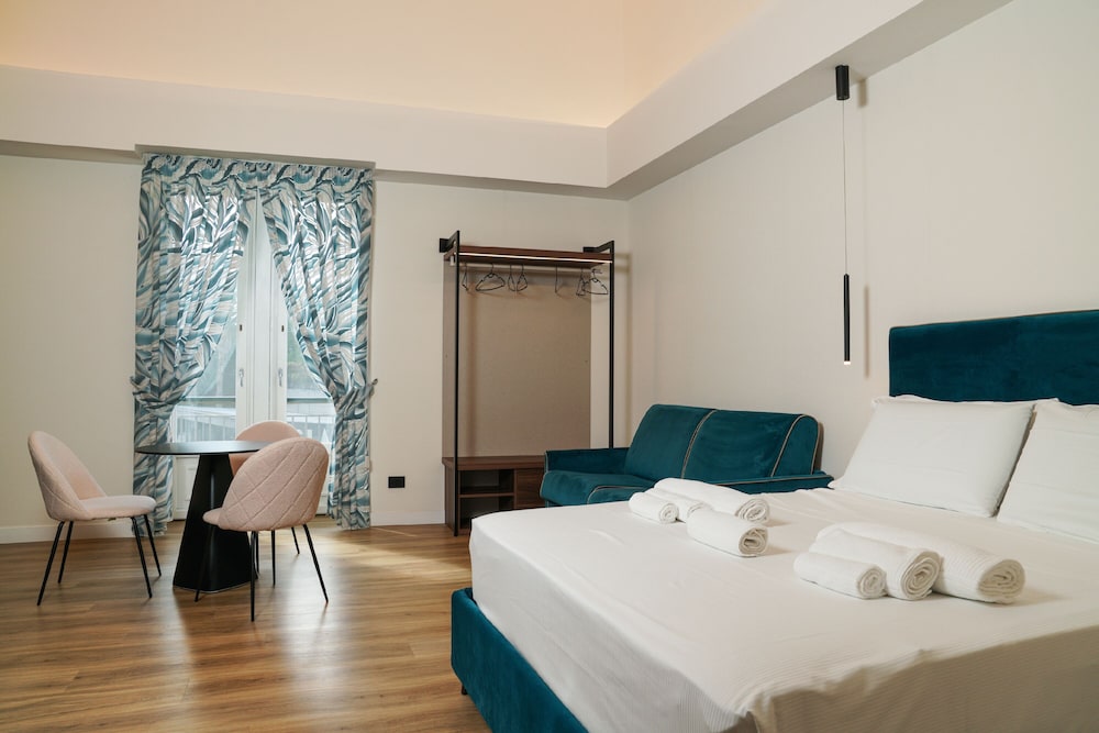 Deluxe Quadruple Room - Photo 6