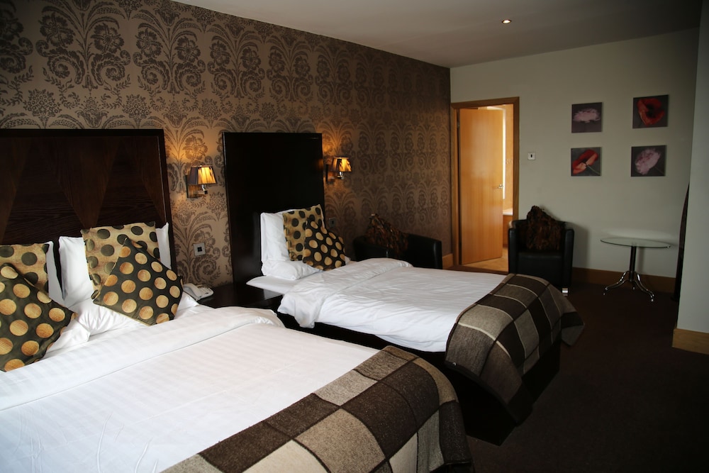 Deluxe Quadruple Room - Photo 1