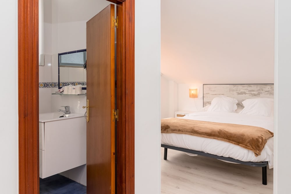 Habitación Cuádruple con Baño Privado