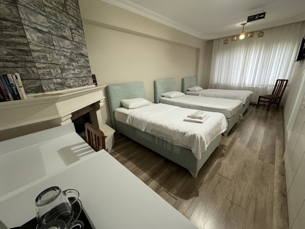 Standard Uc Ayri Yatakli Oda Ozel Banyo, Bahce Manzarali photo 3