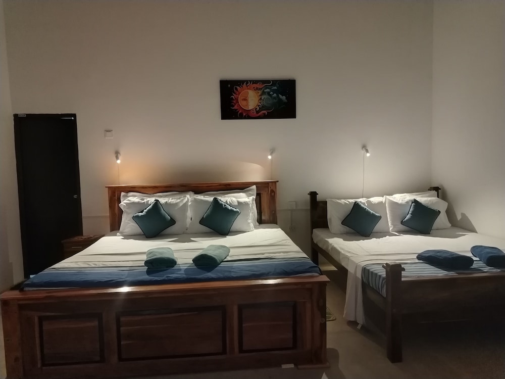 Deluxe Quadruple Room, Garden View photo 3