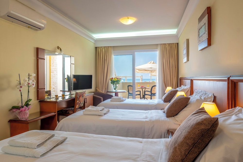 Superior Triple Room with Pool and Partial Sea View