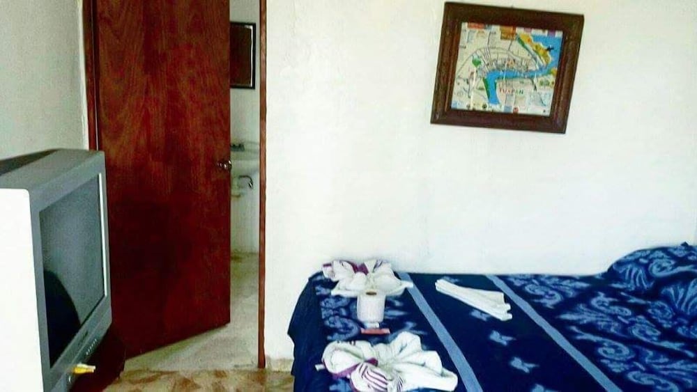Basic Quadruple Room, 1 Bedroom, Beachside photo 3
