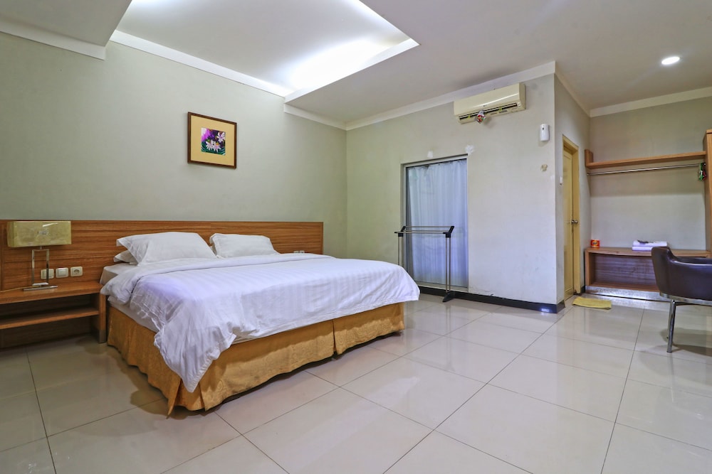 Deluxe Room - Photo 1
