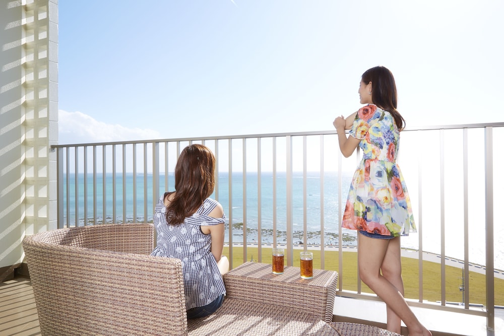 Private open-air Onsen bath / Deluxe Twin Room with Tatami Area / Ocean View photo 3