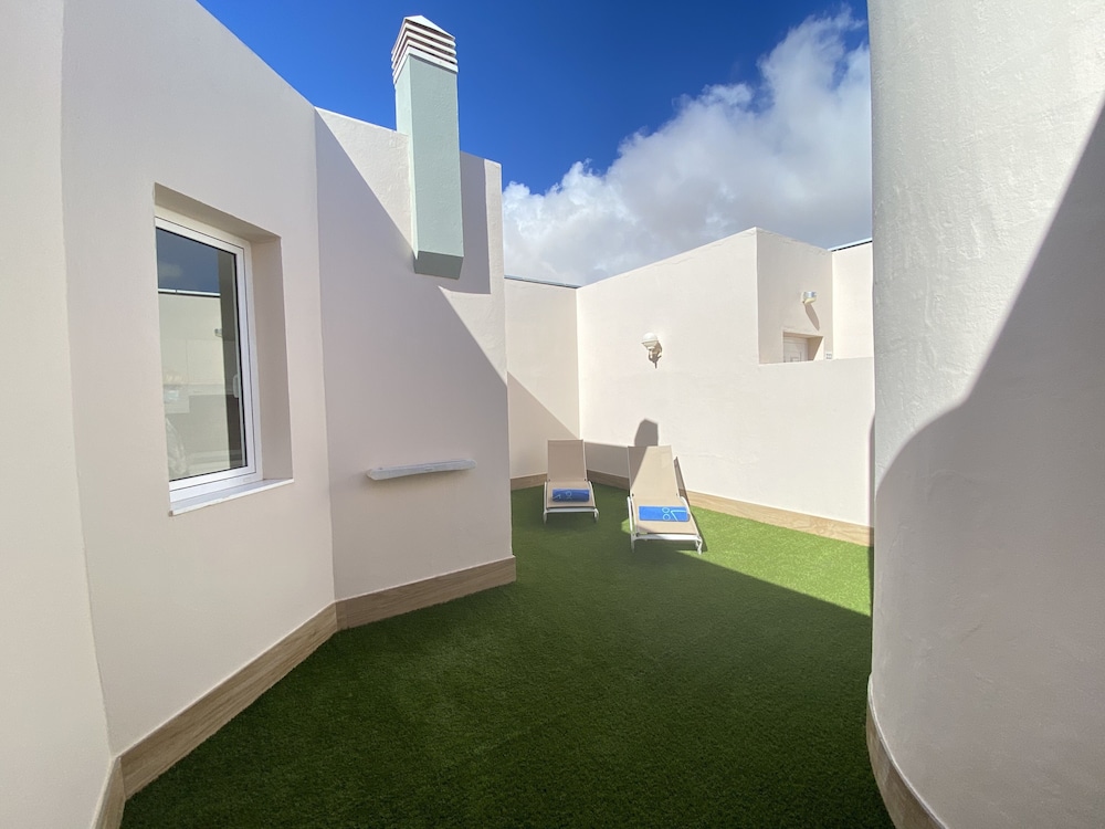 Junior Suite, Terrace, Garden View (1 adult + 3 children) Junior Suite, Terrace, Garden View (1 adult + 3 children)