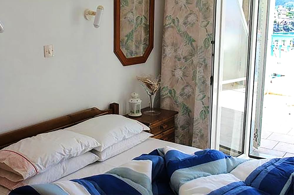 Basic Triple Room, Multiple Beds, Garden View photo 1