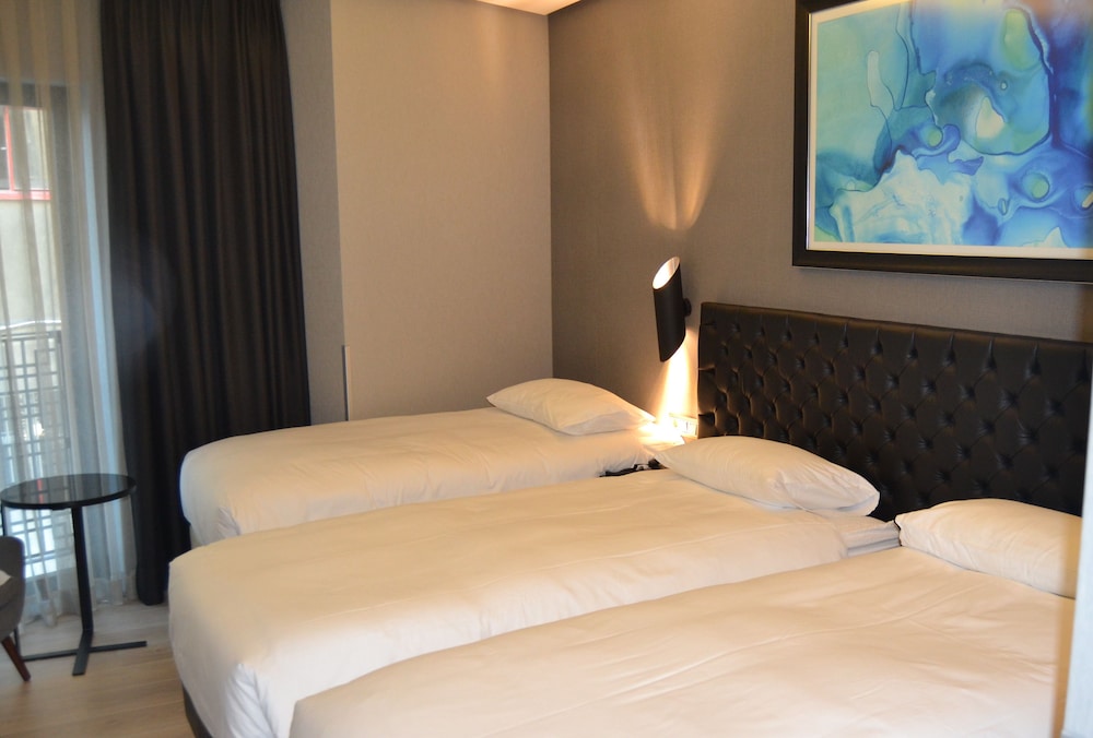 Deluxe Triple Room, 3 Twin Beds photo 1