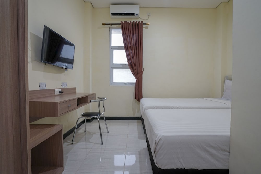 Economy Twin Room - Photo 7