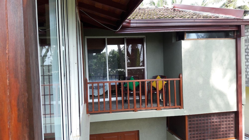 Triple Room, Beach View, Sea Facing photo 3