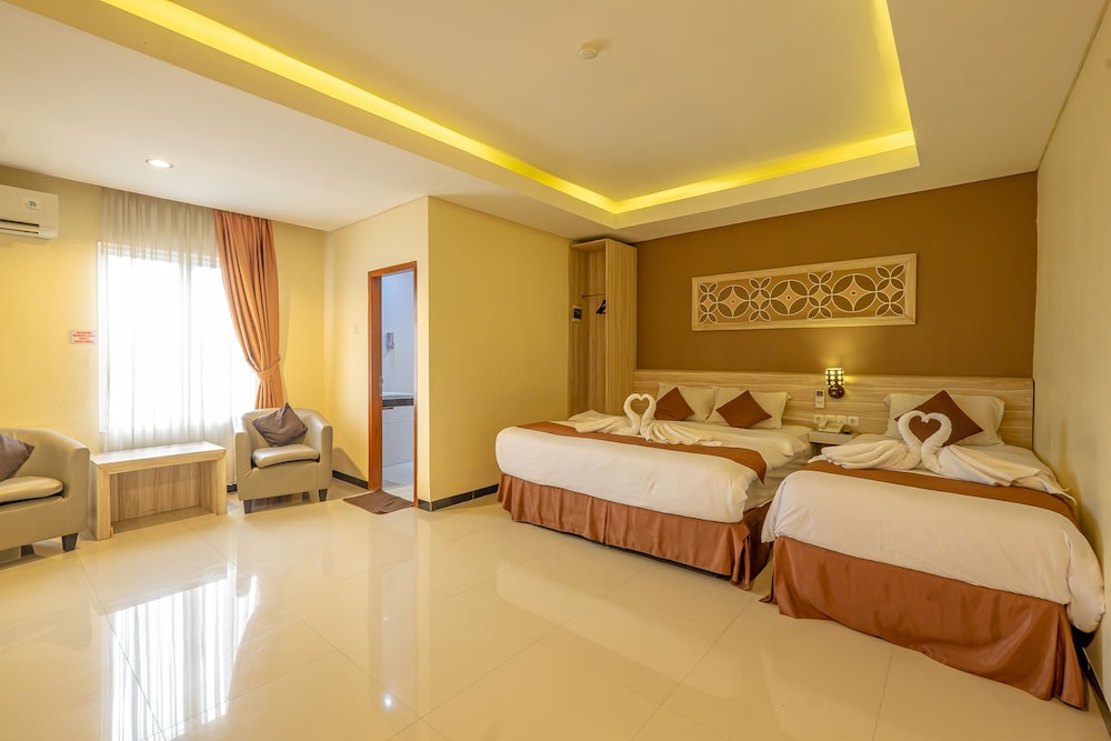 Deluxe Room - Photo 1