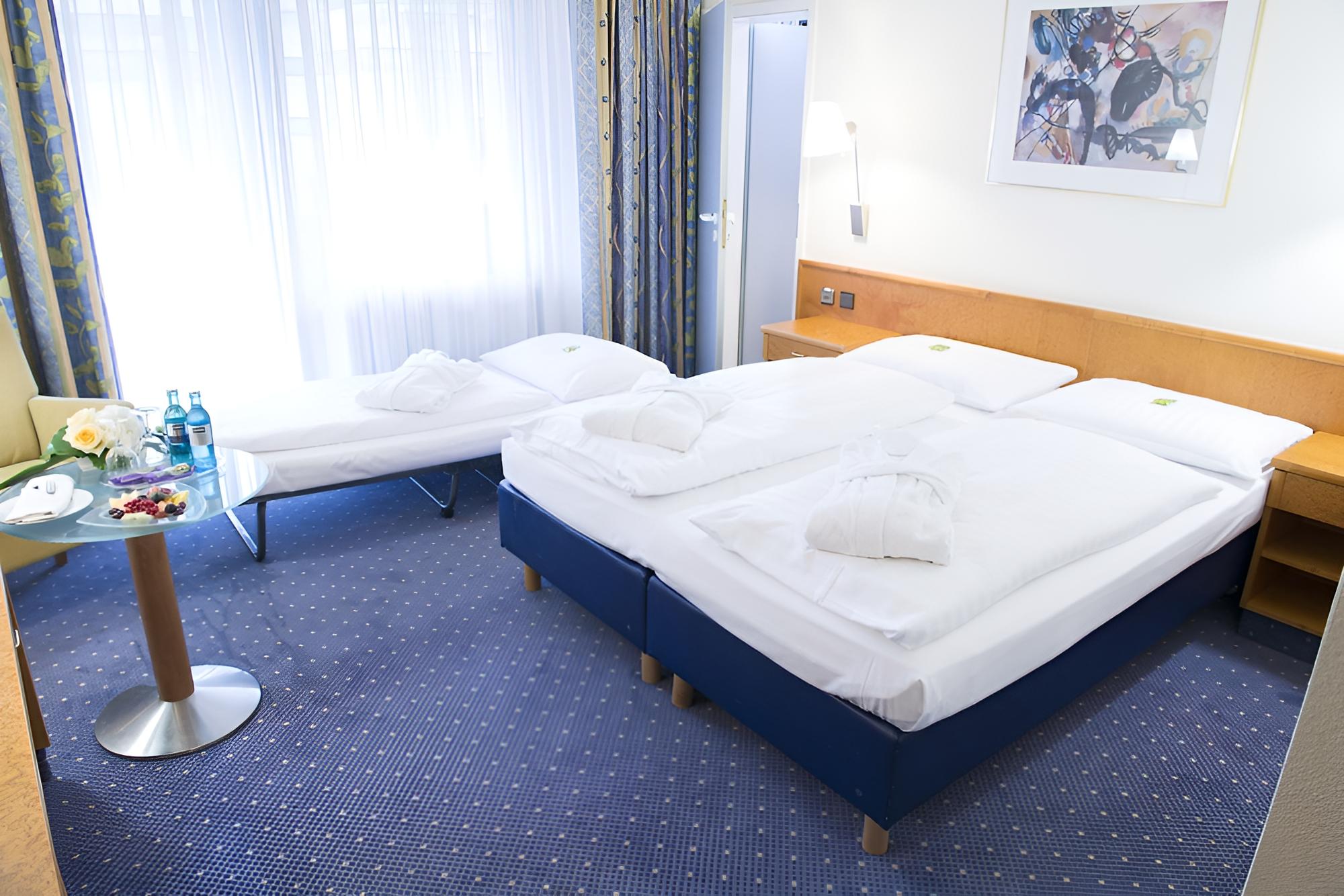Deluxe Quadruple Room, 2 Bedrooms (2 double rooms with connecting door) photo 3