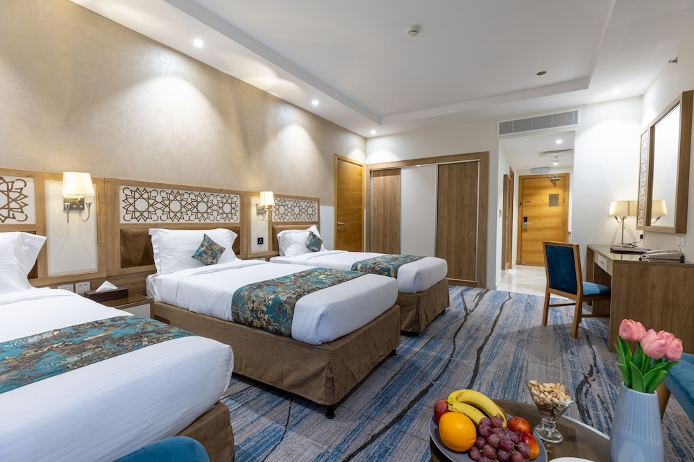 Deluxe Quadruple Room - Photo 2