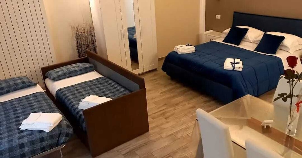 Deluxe Quadruple Room, Balcony photo 1