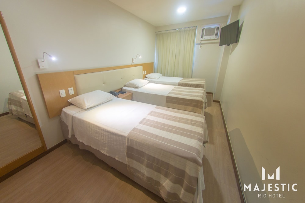 Deluxe Triple Room - Photo 1