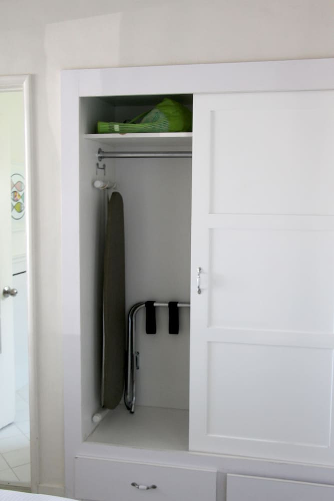 Ocean view king bed and kitchen